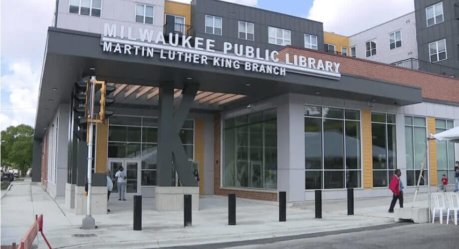 Exterior of the modern Milwaukee Public Library Martin Luther King Branch building with prominent signage.