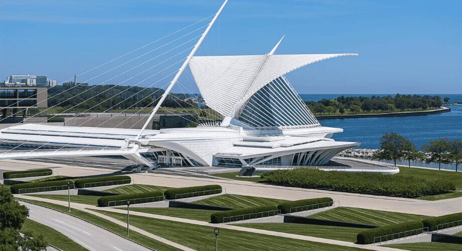 Milwaukee Art Museum Quadracci Pavilion & Lake Michigan Milwaukee Art Museum's white Quadracci Pavilion by Calatrava, Burke Brise Soleil open, with Lake Michigan and blue sky.