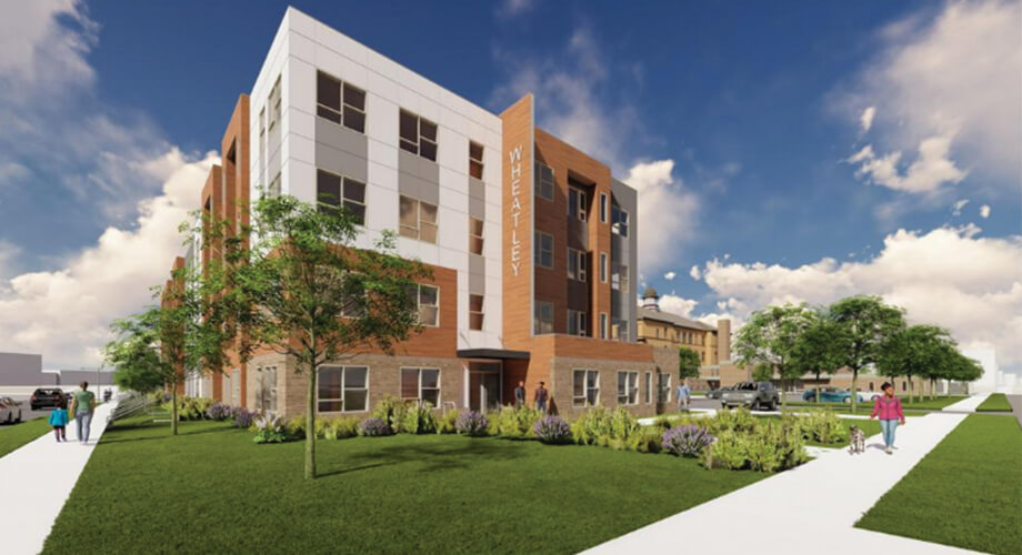 Modern Wheatley building rendering featuring multi-story design, urban street, people, and green landscaping.