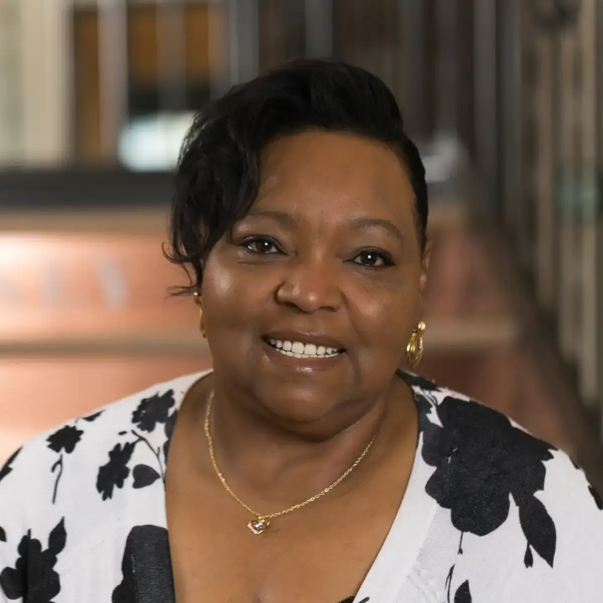 Professional headshot of Linda K. Rucker, a smiling African American woman.