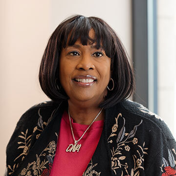 Gold Bader Philanthropies logo with white text and a modern geometric design element.